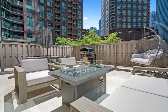 440 N Mcclurg Ct Unit 301, Chicago, IL 60611 - view of patio / terrace featuring an outdoor living space with a fire pit and a view of city