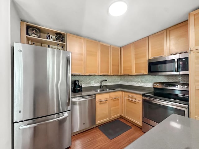 440 N Mcclurg Ct Unit 301, Chicago, IL 60611 - kitchen with appliances with stainless steel finishes, light brown cabinets, and a sink