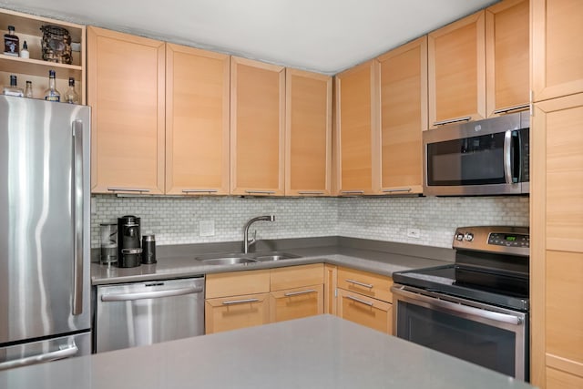 440 N Mcclurg Ct Unit 301, Chicago, IL 60611 - kitchen featuring appliances with stainless steel finishes, light brown cabinets, and a sink