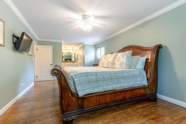 605 E Golf Rd, Libertyville, IL 60048 - bedroom with wood finished floors, baseboards, crown molding, and ceiling fan