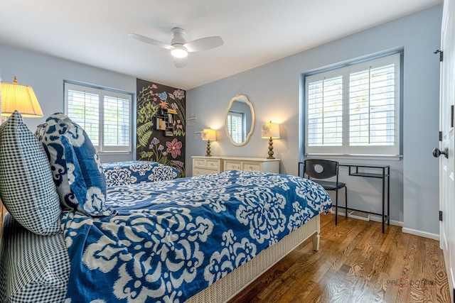 605 E Golf Rd, Libertyville, IL 60048 - bedroom featuring wood finished floors, a ceiling fan, and baseboards