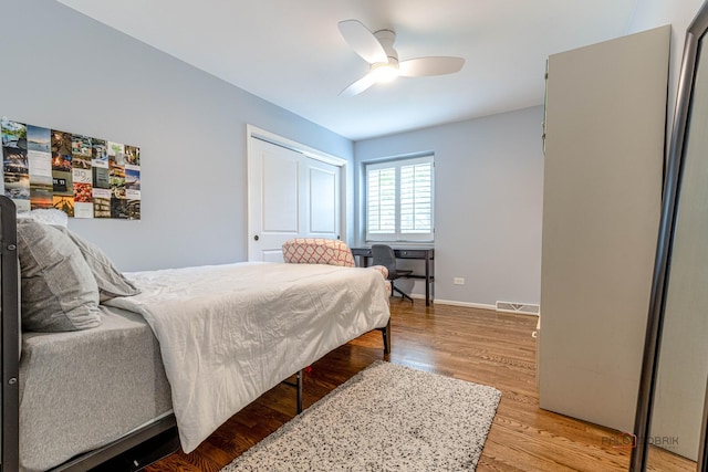 605 E Golf Rd, Libertyville, IL 60048 - bedroom featuring light wood finished floors, a closet, baseboards, and ceiling fan