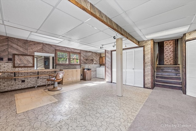 6704 Cypress Ct, Crystal Lake, IL 60012 - below grade area featuring washer / clothes dryer, a paneled ceiling, stairs, and wood walls