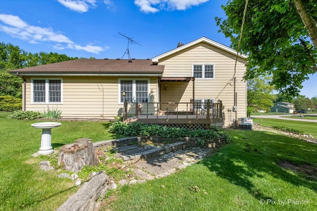 6704 Cypress Ct, Crystal Lake, IL 60012 - rear view of house featuring a deck and a lawn