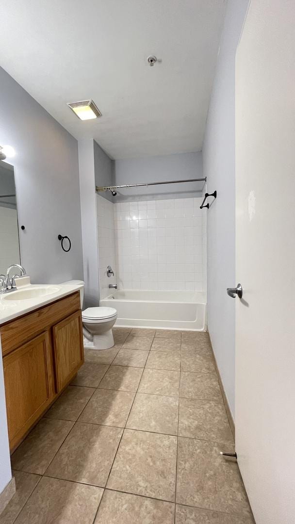 3522 S State St Unit 301, Chicago, IL 60609 - full bath with vanity, washtub / shower combination, tile patterned floors, and toilet