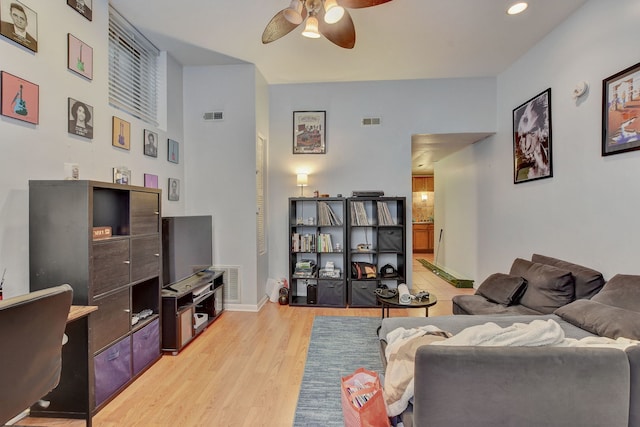 3342 S Aberdeen St, Chicago, IL 60608 - living room featuring a ceiling fan, light wood finished floors, baseboards, and recessed lighting