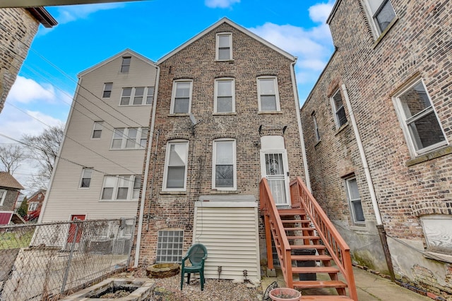 3342 S Aberdeen St, Chicago, IL 60608 - view of front of home with brick siding and a fire pit