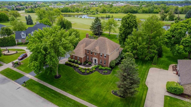 24065 Brancaster Dr, Naperville, IL 60564 - aerial view of property and surrounding area featuring a large body of water and a tree filled landscape