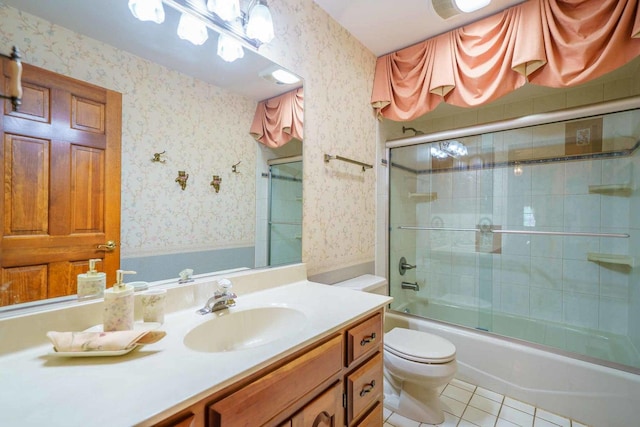 24065 Brancaster Dr, Naperville, IL 60564 - full bath featuring tile patterned flooring, vanity, toilet, wallpapered walls, and combined bath / shower with glass door