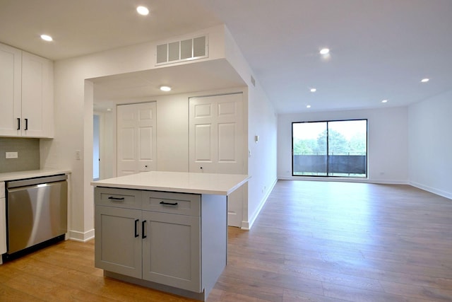 700 Wellington Ave Unit 315, Elk Grove Village, IL 60007 - kitchen featuring dishwasher, light wood-type flooring, baseboards, and recessed lighting
