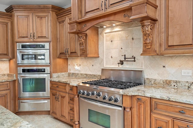 24355 S Arranmore Way, Frankfort, IL 60423 - kitchen with a warming drawer, stainless steel appliances, decorative backsplash, and brown cabinetry