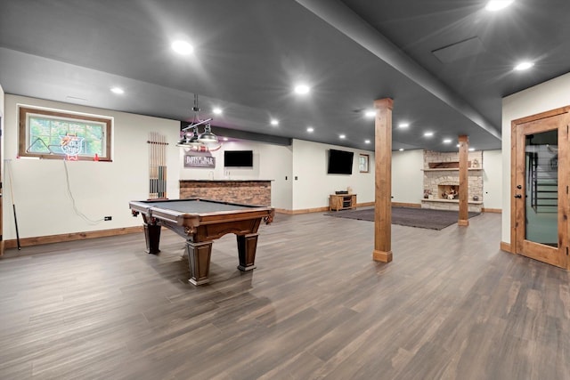 24355 S Arranmore Way, Frankfort, IL 60423 - game room with baseboards, a stone fireplace, dark wood-type flooring, and recessed lighting