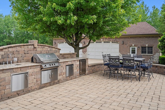 24355 S Arranmore Way, Frankfort, IL 60423 - view of patio / terrace featuring a sink and an attached garage