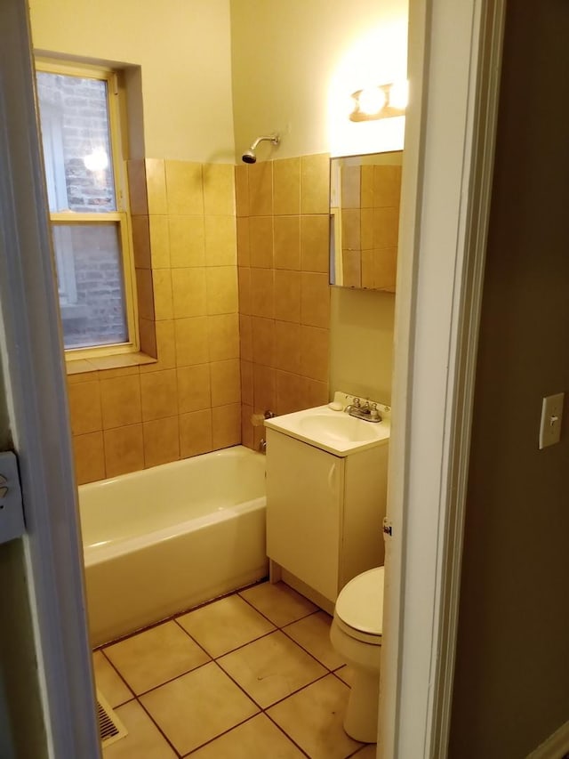 3926 W Flournoy St, Chicago, IL 60624 - full bathroom with toilet, vanity, tile patterned flooring, and tub / shower combination