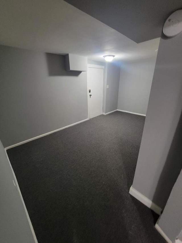 5149 S Marshfield Ave, Chicago, IL 60609 - finished below grade area featuring baseboards and dark colored carpet