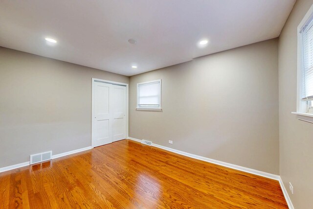 521 Buckthorn Ln, Hillside, IL 60162 - unfurnished room with baseboards, light wood-type flooring, and recessed lighting