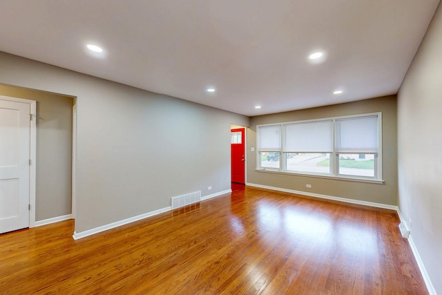 521 Buckthorn Ln, Hillside, IL 60162 - spare room featuring wood finished floors, baseboards, and recessed lighting