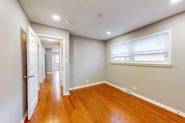 521 Buckthorn Ln, Hillside, IL 60162 - unfurnished room with light wood finished floors, baseboards, recessed lighting, and a smoke detector