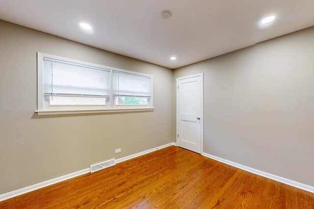 521 Buckthorn Ln, Hillside, IL 60162 - unfurnished room with baseboards, wood finished floors, and recessed lighting