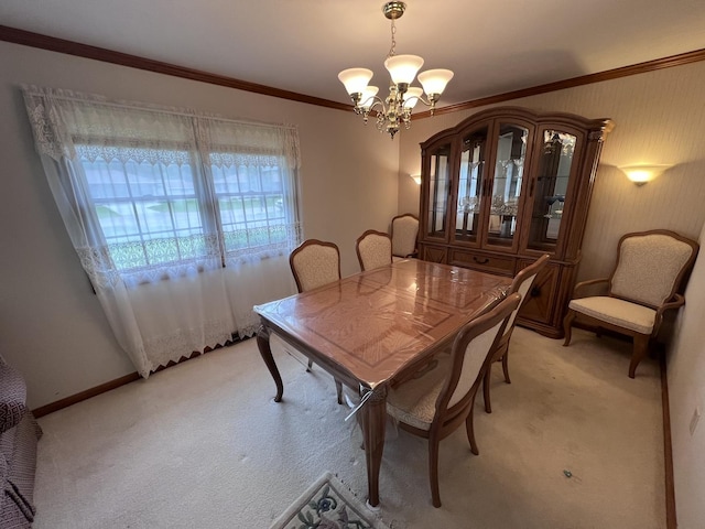 308 Tree Ln, Prophetstown, IL 61277 - dining area featuring a chandelier, light carpet, crown molding, and baseboards