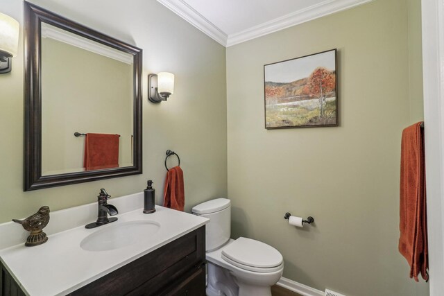 7316 Gleneagle Cir, Lakewood, IL 60014 - bathroom with toilet, crown molding, vanity, and baseboards