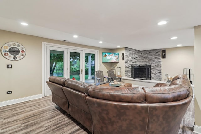 7316 Gleneagle Cir, Lakewood, IL 60014 - living room featuring wood finished floors, a fireplace, baseboards, and recessed lighting