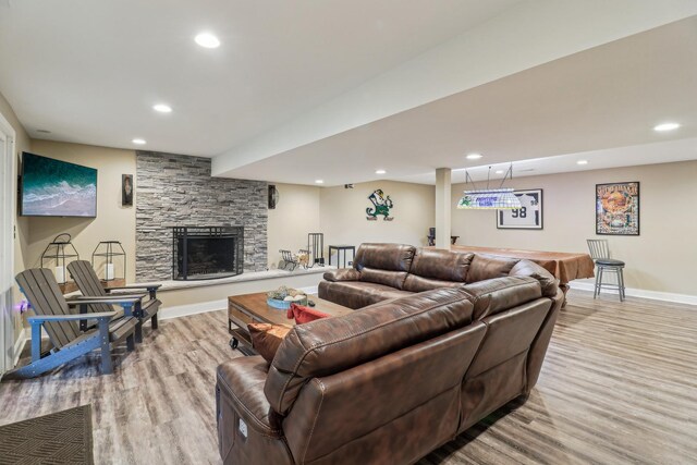 7316 Gleneagle Cir, Lakewood, IL 60014 - living area with light wood-style flooring, baseboards, recessed lighting, and a fireplace