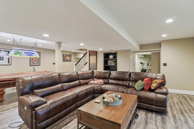 7316 Gleneagle Cir, Lakewood, IL 60014 - living area featuring light wood-style floors, stairway, baseboards, recessed lighting, and bar