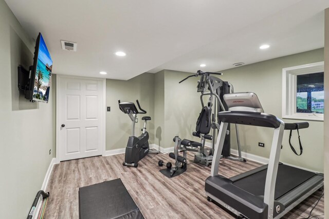7316 Gleneagle Cir, Lakewood, IL 60014 - exercise area featuring wood finished floors, baseboards, and recessed lighting