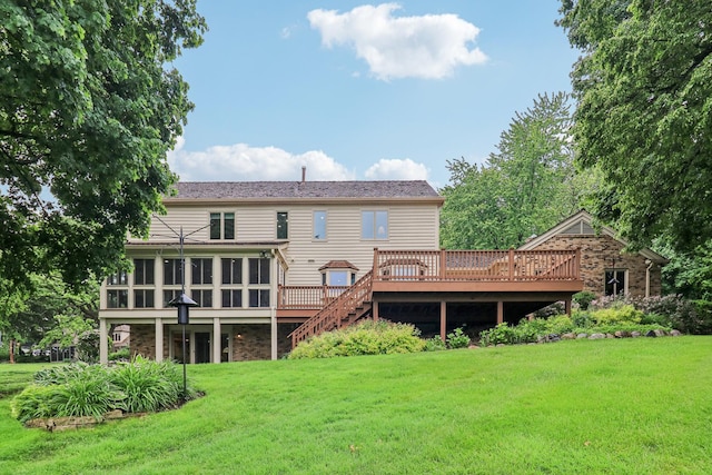 7316 Gleneagle Cir, Lakewood, IL 60014 - back of property featuring a wooden deck, a lawn, a sunroom, and stairs