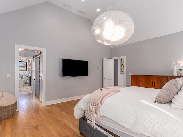 527 N Ellsworth St, Naperville, IL 60563 - bedroom featuring high vaulted ceiling, light wood finished floors, and baseboards