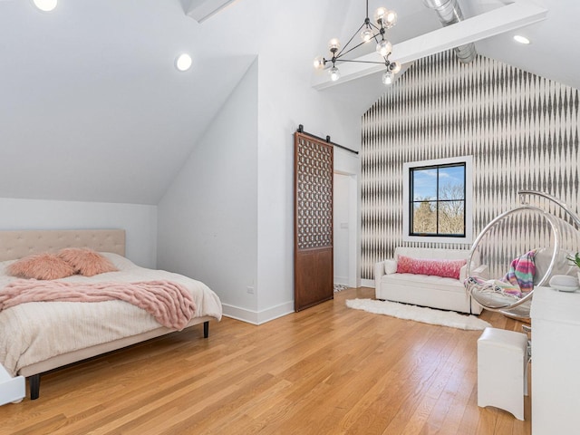 527 N Ellsworth St, Naperville, IL 60563 - bedroom featuring lofted ceiling, a barn door, light wood-style floors, a chandelier, and baseboards