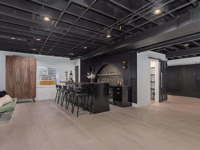 527 N Ellsworth St, Naperville, IL 60563 - indoor bar featuring wood finished floors and a barn door