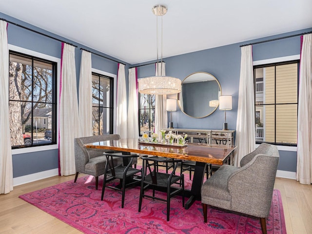 527 N Ellsworth St, Naperville, IL 60563 - dining area with wood finished floors and baseboards