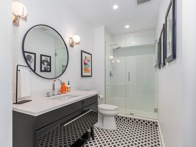 527 N Ellsworth St, Naperville, IL 60563 - bathroom featuring toilet, vanity, a shower stall, and recessed lighting