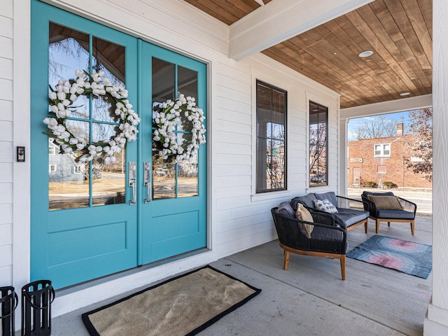 527 N Ellsworth St, Naperville, IL 60563 - property entrance with french doors and an outdoor living space
