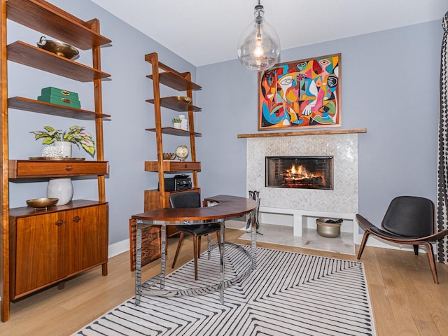 527 N Ellsworth St, Naperville, IL 60563 - home office with light wood-style floors and a tiled fireplace