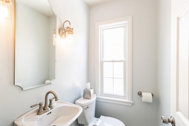 1628 W Brown St, Arlington Heights, IL 60004 - bathroom with toilet and a sink
