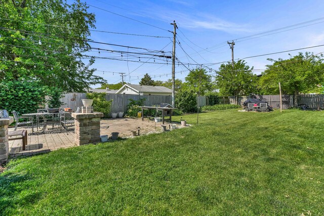 127 Saint Joseph Ave, Joliet, IL 60436 - view of yard featuring a patio