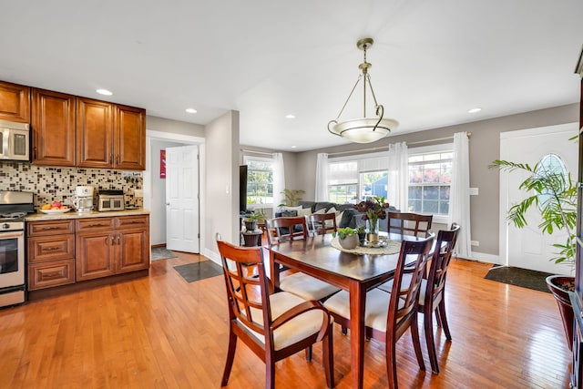 127 Saint Joseph Ave, Joliet, IL 60436 - dining space with light wood-type flooring, recessed lighting, and baseboards