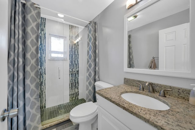 127 Saint Joseph Ave, Joliet, IL 60436 - full bathroom featuring vanity, a shower stall, and toilet