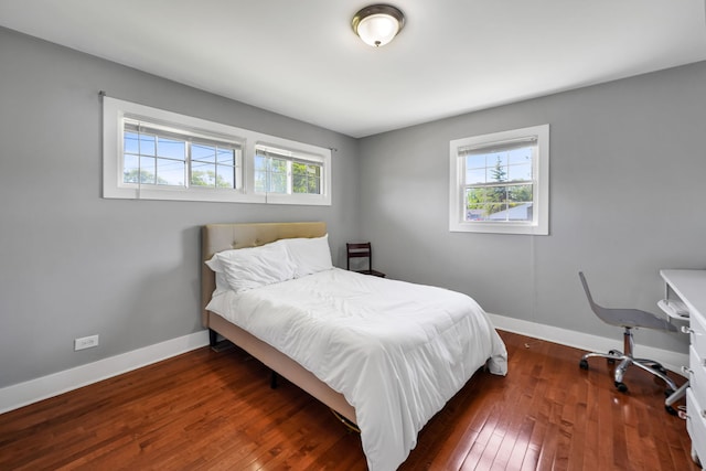 127 Saint Joseph Ave, Joliet, IL 60436 - bedroom with multiple windows, baseboards, and hardwood / wood-style flooring