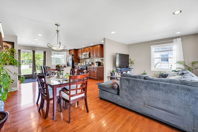 127 Saint Joseph Ave, Joliet, IL 60436 - dining room with light wood finished floors and recessed lighting