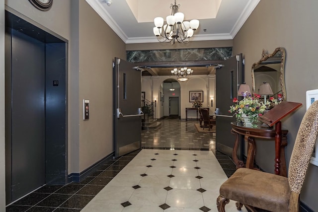 212 N Center St Unit 502, Bloomington, IL 61701 - hallway featuring elevator, a chandelier, arched walkways, crown molding, and baseboards