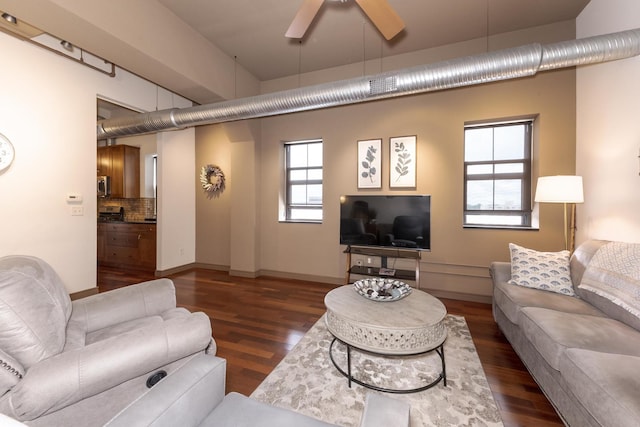 212 N Center St Unit 502, Bloomington, IL 61701 - living room featuring wood finished floors, ceiling fan, and baseboards