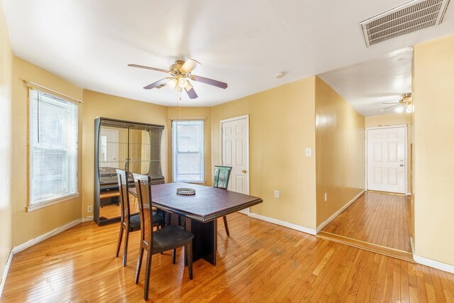 1826 N Keeler Ave, Chicago, IL 60639 - dining area featuring ceiling fan, light wood-style flooring, and baseboards