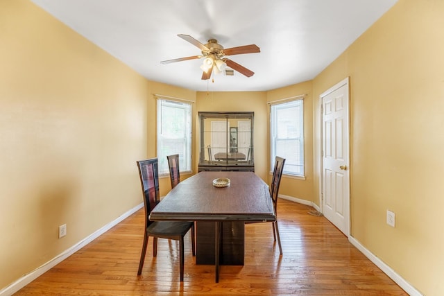 1826 N Keeler Ave, Chicago, IL 60639 - dining room with a ceiling fan, baseboards, and wood finished floors