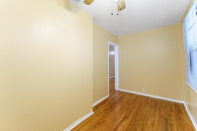 1826 N Keeler Ave, Chicago, IL 60639 - empty room featuring baseboards, light wood finished floors, and a ceiling fan