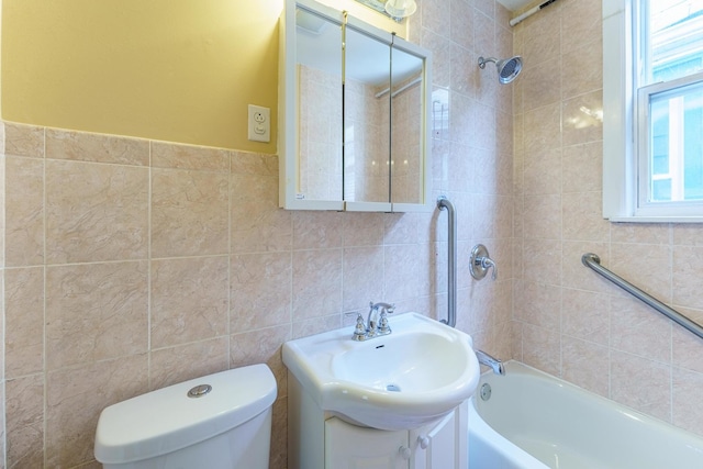 1826 N Keeler Ave, Chicago, IL 60639 - bathroom featuring tile walls, toilet, vanity, and tub / shower combination