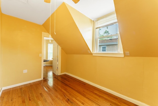 1826 N Keeler Ave, Chicago, IL 60639 - additional living space with wood finished floors, plenty of natural light, baseboards, and a ceiling fan